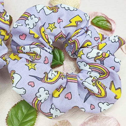 Experience the magic with our handcrafted Purple Unicorn Scrunchie from myluxeoccasion!