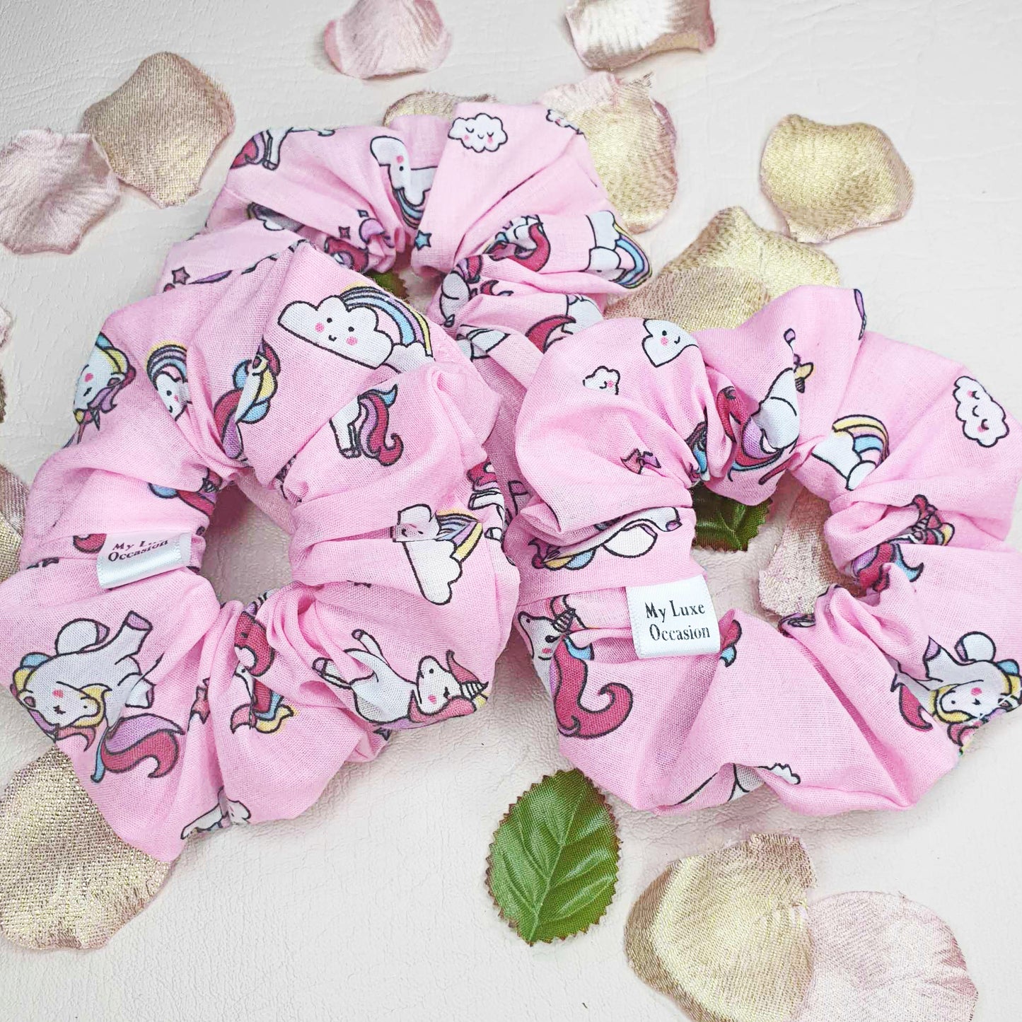 Add a touch of magic to your hair with our Pink Unicorn Scrunchie! Handmade by MyLuxeOccasion